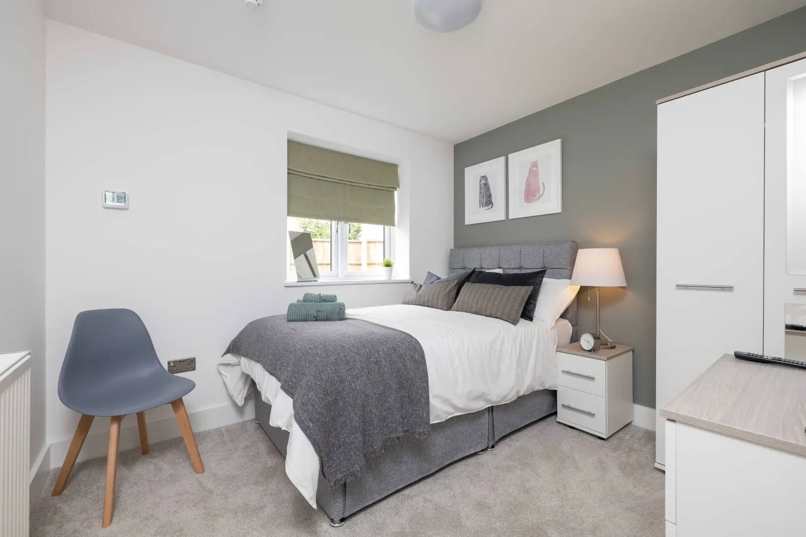 Furnished double bedroom with desk and wardrobe at 3 Burnell Avenue