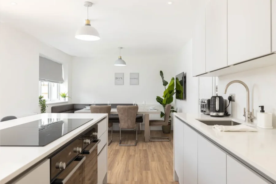 Modern shared kitchen and dining area at 3 Burnell Avenue