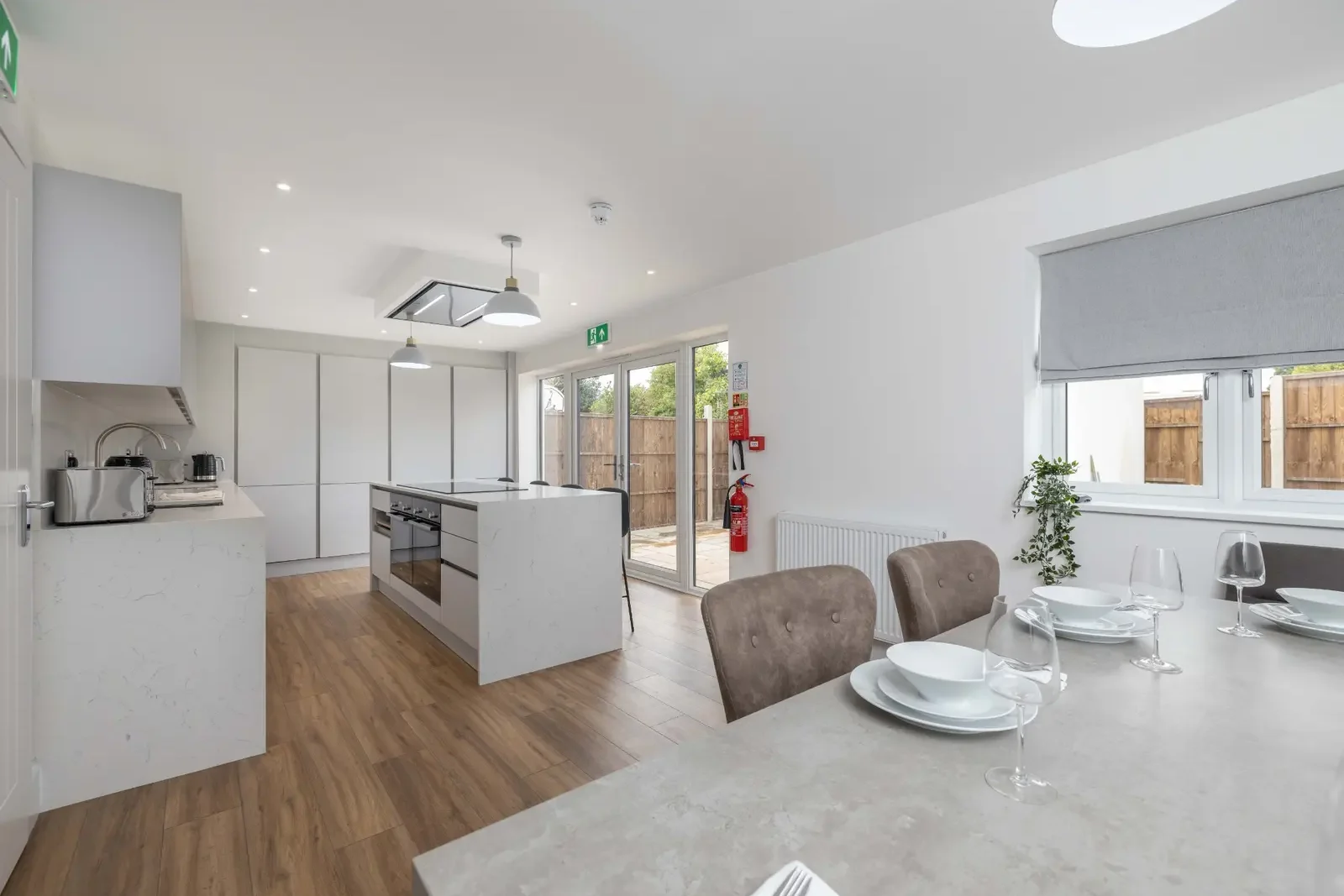 Open-plan shared kitchen and dining space at 3 Burnell Avenue